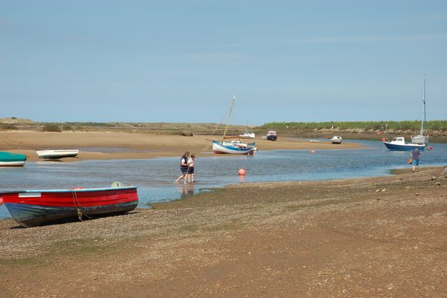 Paddling in low tide at the Staithe